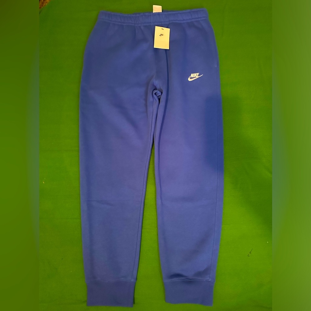 "Unlock style and comfort with this for-sale large royal blue joggers (NWT)